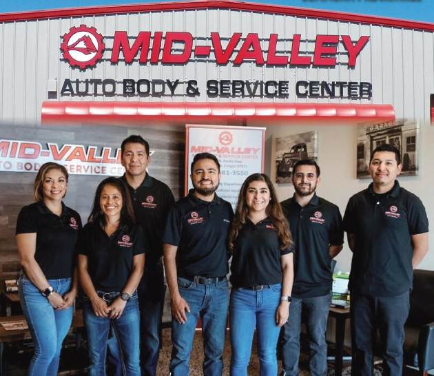 Mid Valley Auto Body team smiling in a group